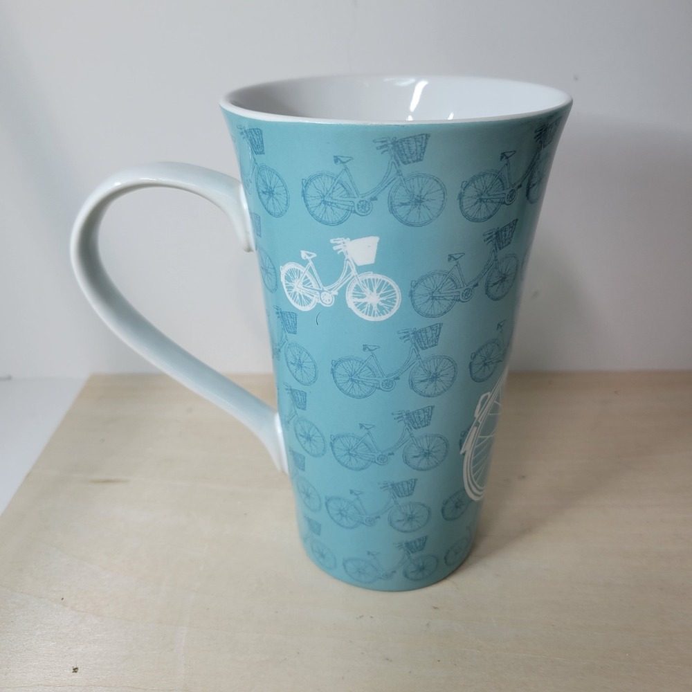 222 Fifth Take A‎ Ride Turquoise Bicycle Basket Tall Latte Coffee Mug - Picture 2 of 6